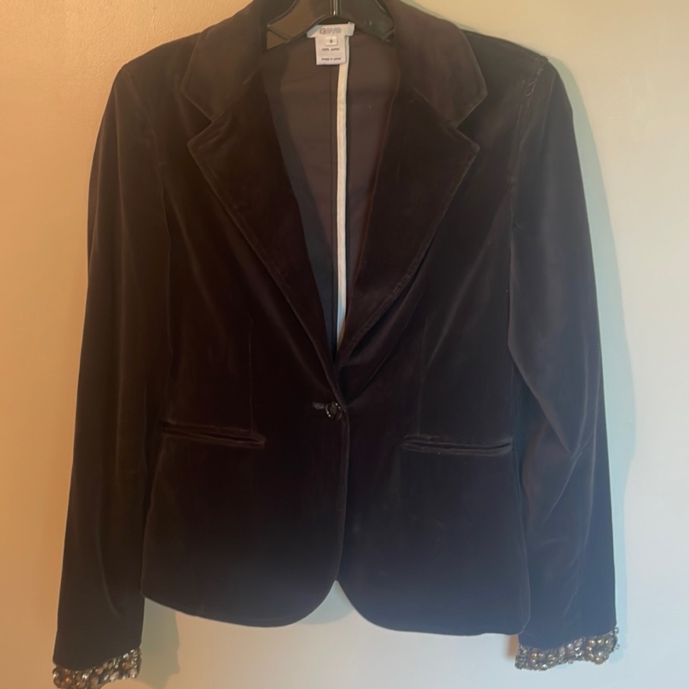 Chocolate velvet blazer copper jeweled cuffs .